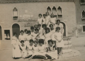 Lacemakers outside the school